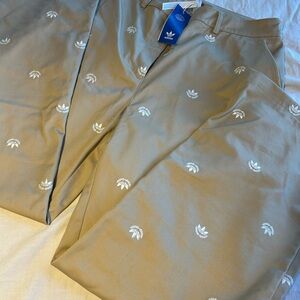 adidas ladies kaki Embroidered chino Trefoil Pants.